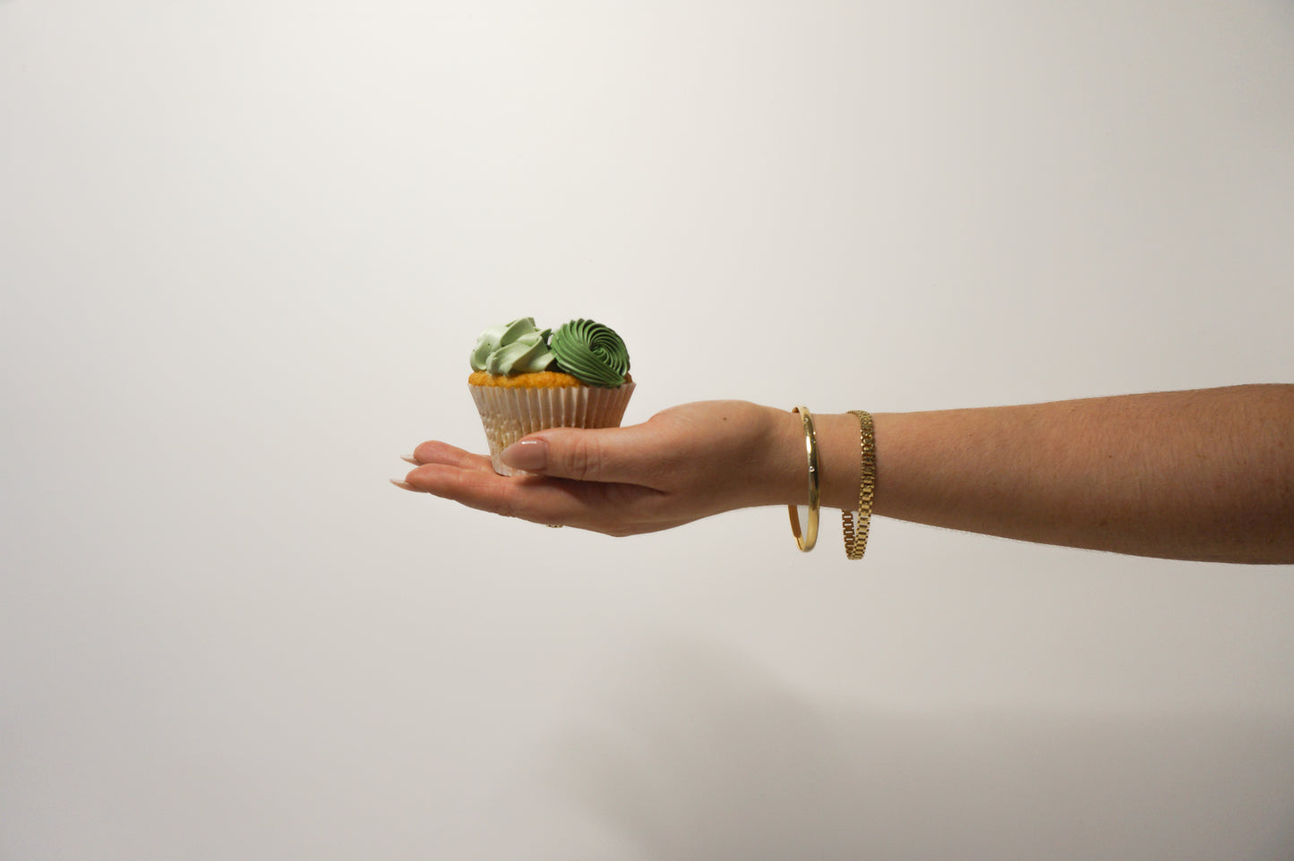 cupcake with green buttercream